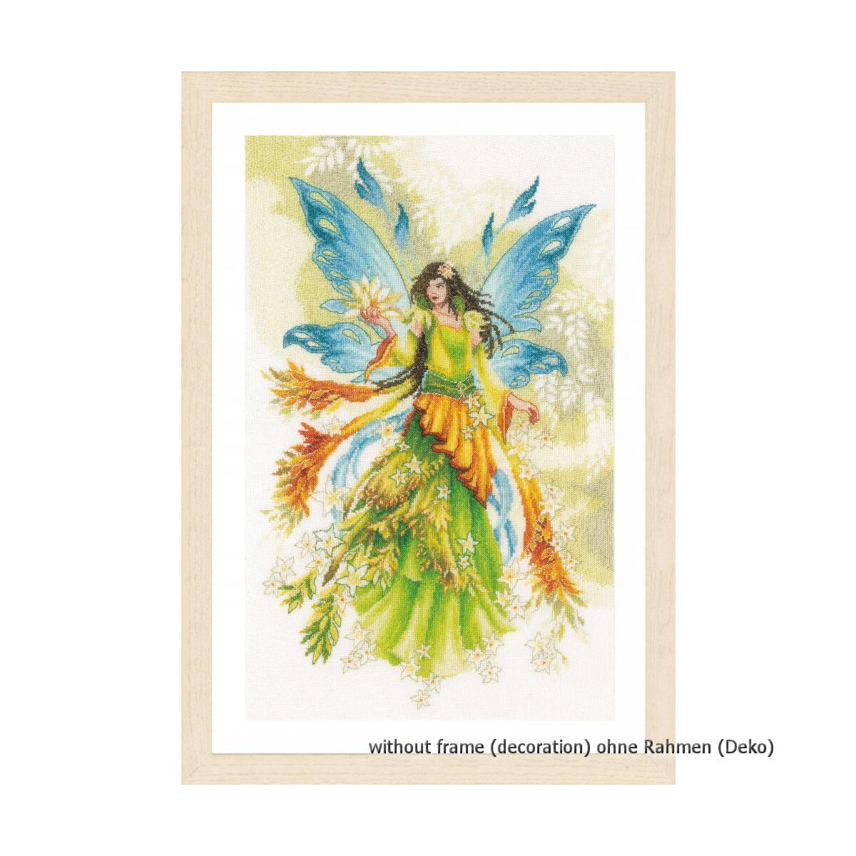 A cross stitch artwork of a fairy in a green dress with...