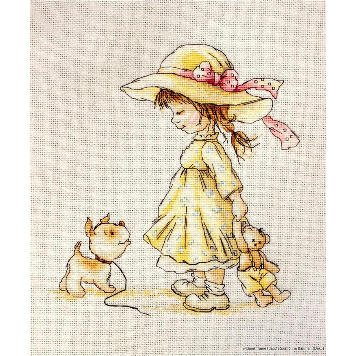 A young girl with a wide-brimmed hat with a pink bow is...