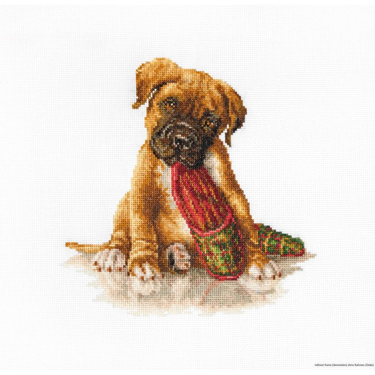 A cross stitch design depicting a small light brown puppy...