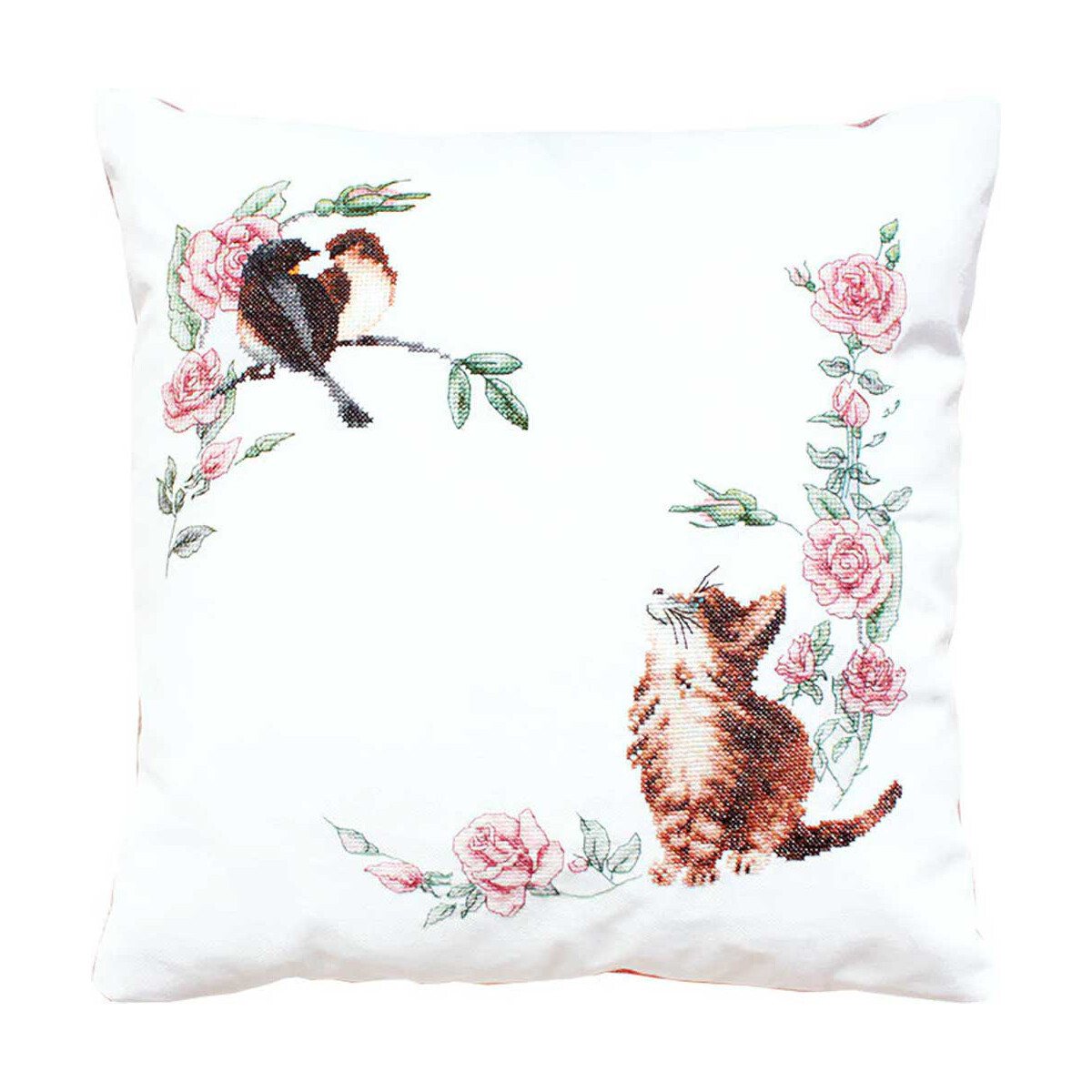 A white throw pillow with an enchanting cross-stitch...
