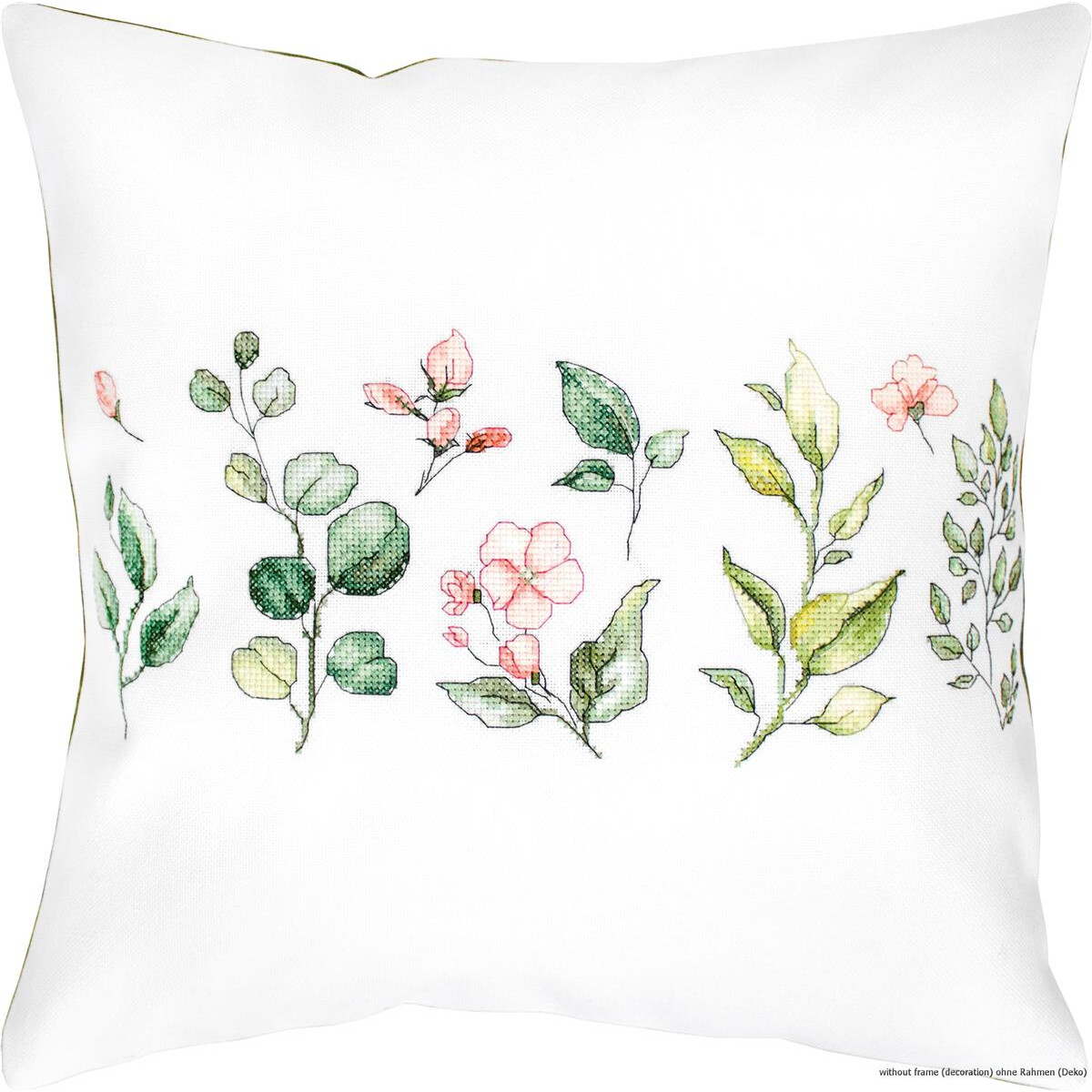 A white decorative cushion with a pattern of...