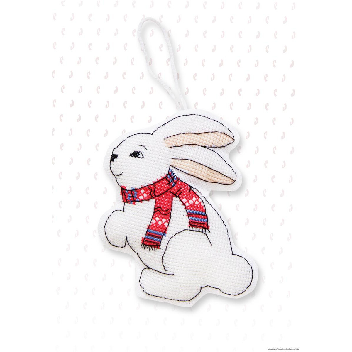 A white cross stitch bunny with a red and blue patterned...