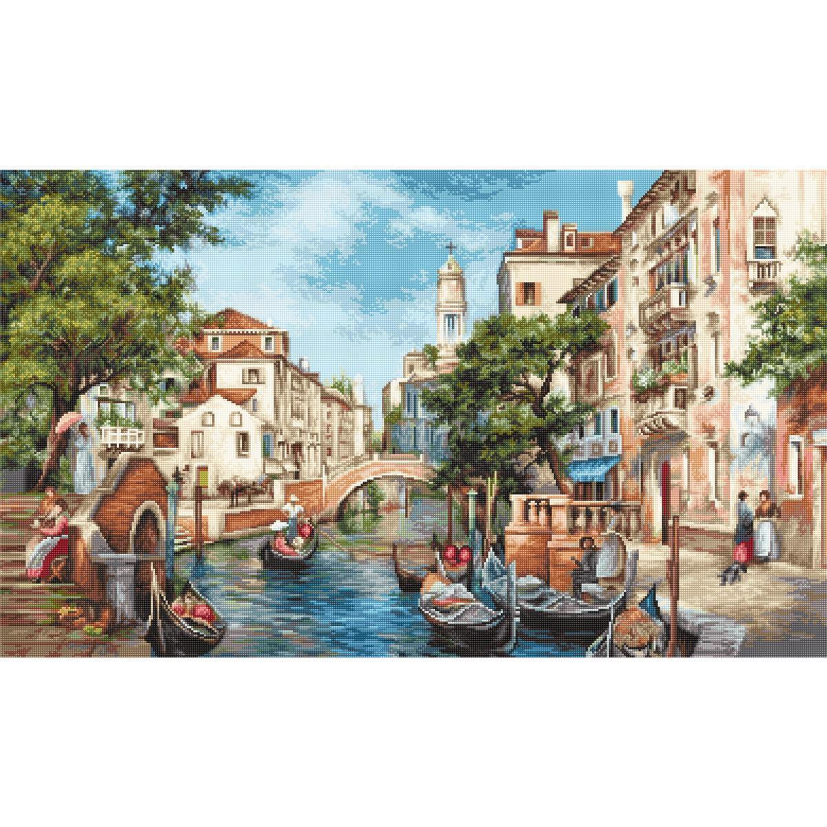 Eine malerische Kanalszene in Venedig mit Gondeln, die...