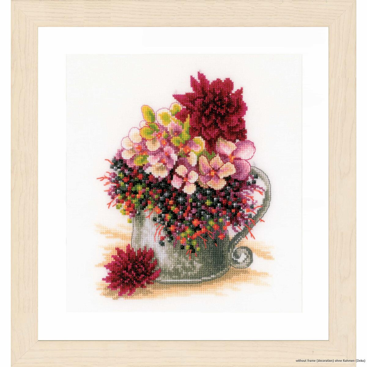 A framed floral cross stitch pattern **(embroidery...