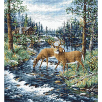 Pixel art image of two deer standing in a shallow stream surrounded by dense forest. One deer is drinking water while the other watches. A log cabin and a chimney with smoke can be seen in the background. Tall pines and small bushes line the stream, above them is a cloudy sky reminiscent of a beautiful Luca-s embroidery pack.
