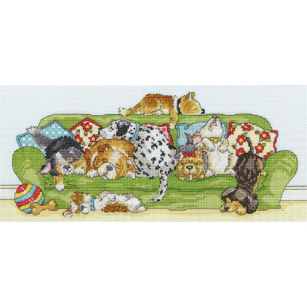 A colorful embroidery pack with seven playful puppies sleeping on and around a green sofa from Bothy Threads. The cross stitch picture shows different breeds surrounded by toys and bones. Pillows with floral patterns adorn the sofa, creating a cozy indoor scene that is perfect for any embroidery lover.