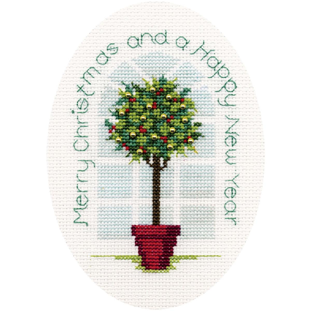 Cross stitch image of a small tree with red and yellow...