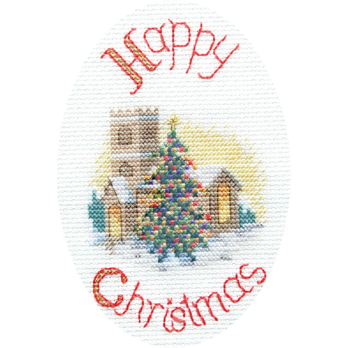 A cross stitch Christmas card that says Merry Christmas...