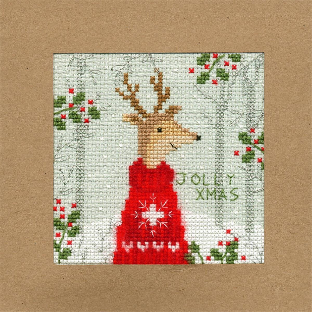 An embroidery with a reindeer in a red sweater with a...