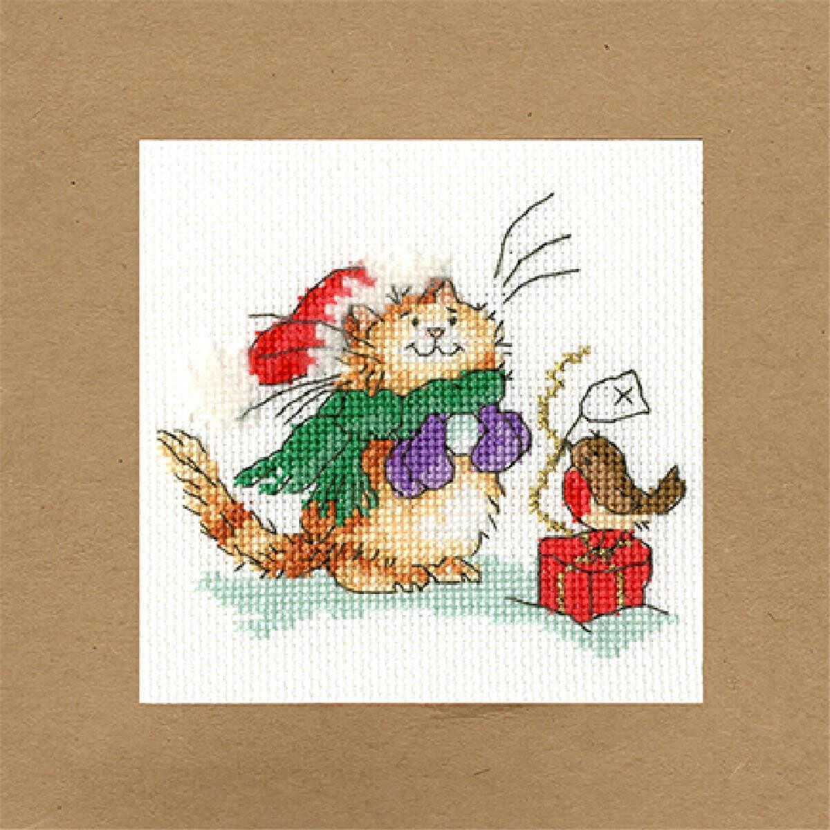 An enchanting cross stitch picture shows a fluffy orange...