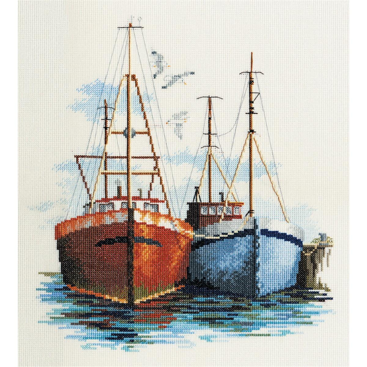An embroidery pack from Bothy Threads showing two moored...