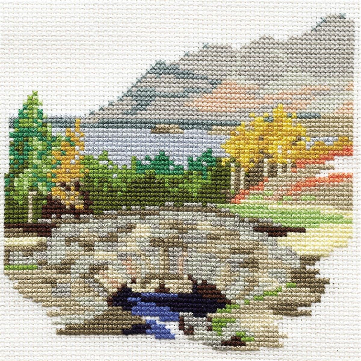 An embroidery pack from Bothy Threads shows a picturesque...