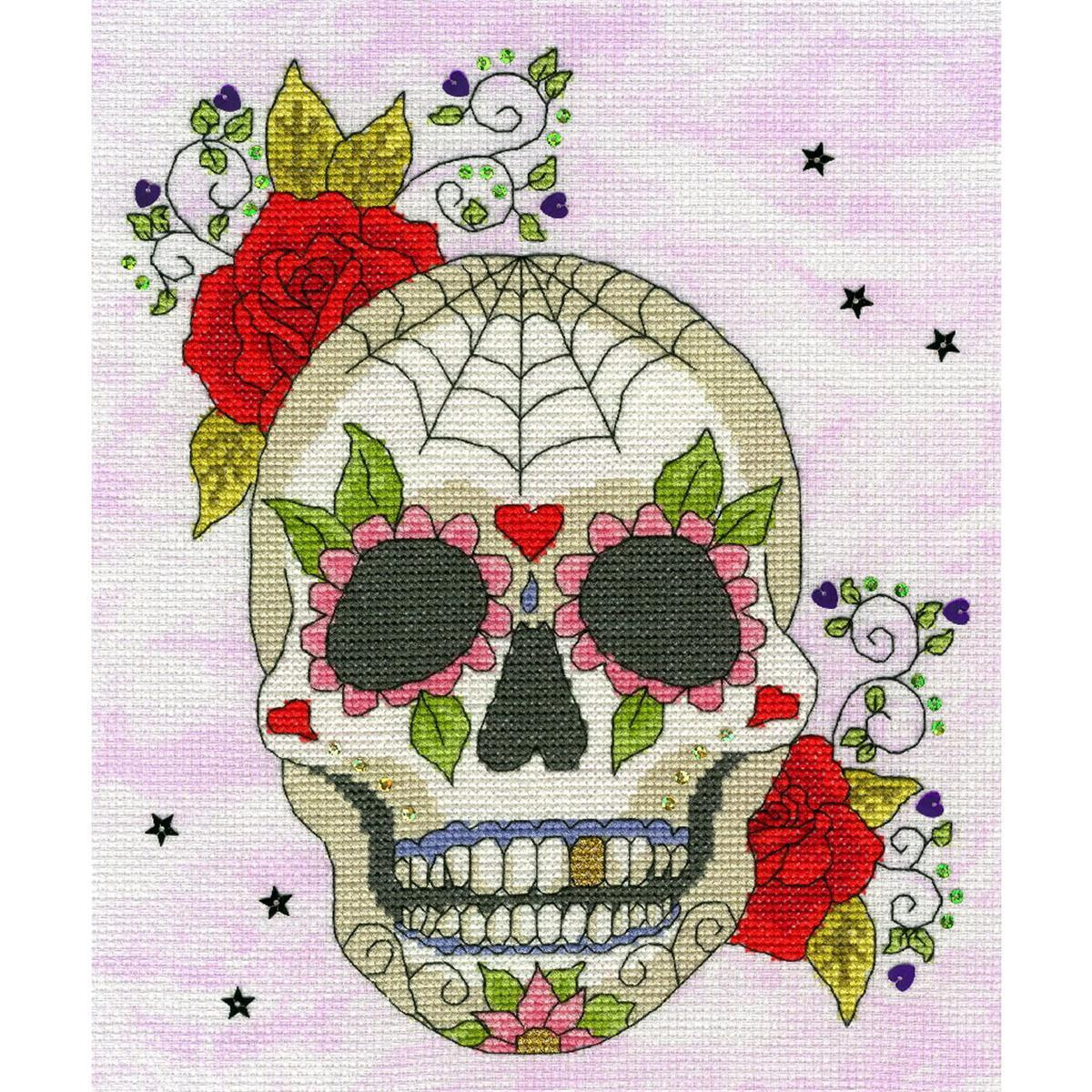 An embroidered skull, decorated with flowers and...