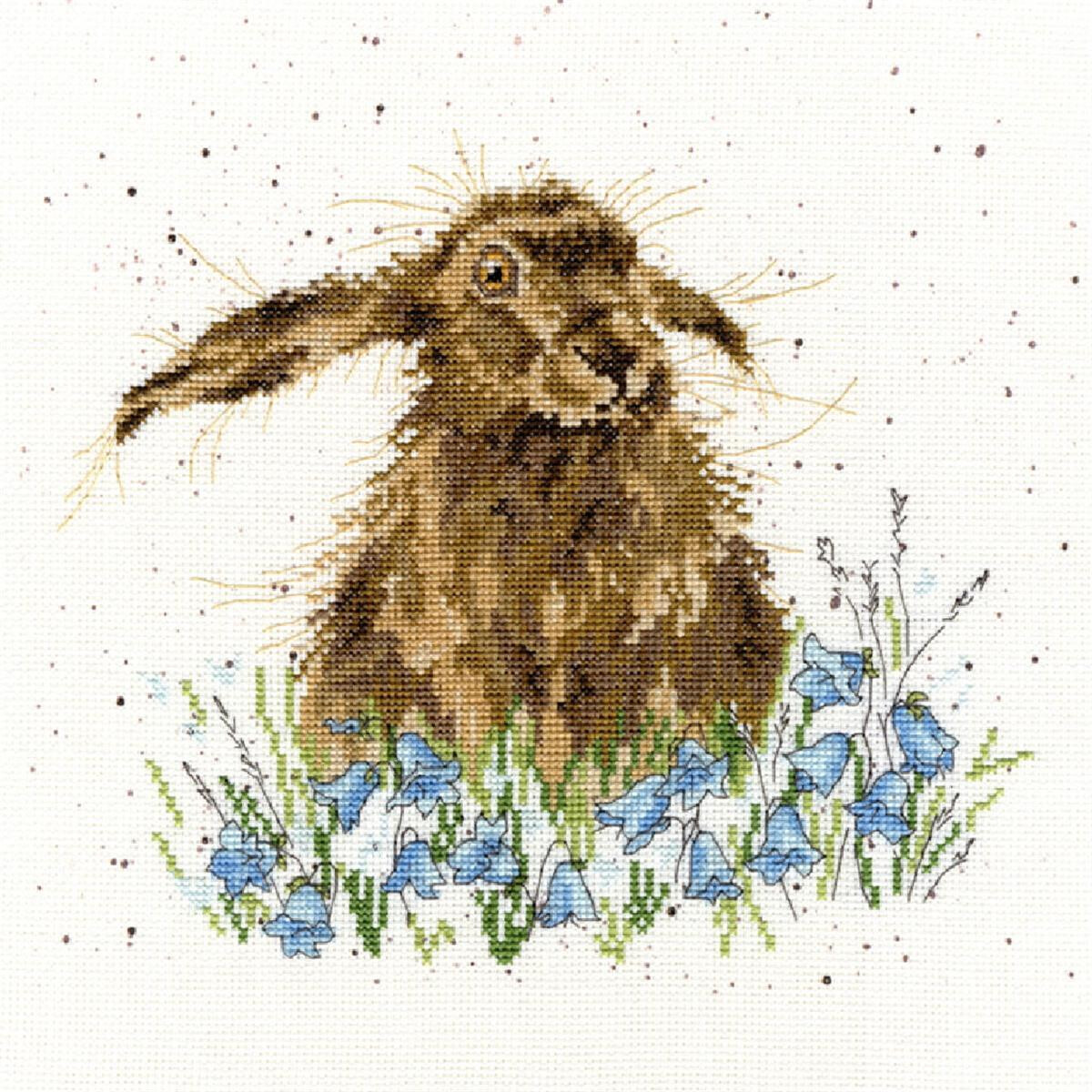 Detailed cross stitch of a brown rabbit with long ears...