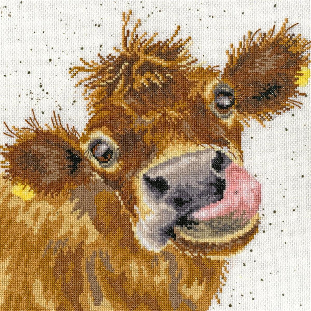 Eine Stickpackung-Darstellung einer braunen Kuh mit...