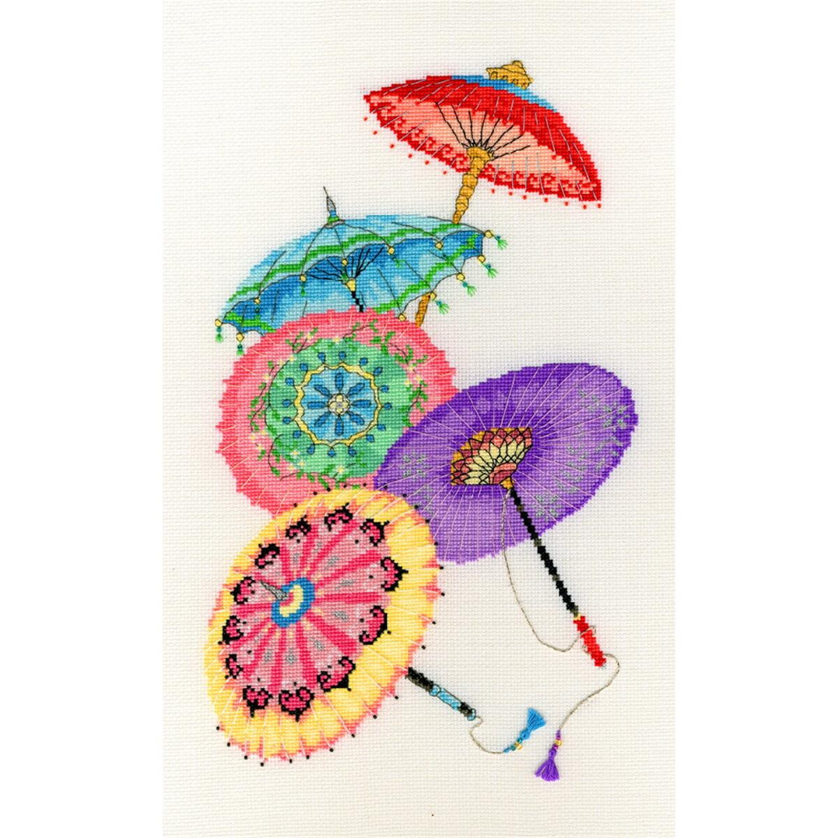 An embroidery pack with four colorful, artistic parasols...
