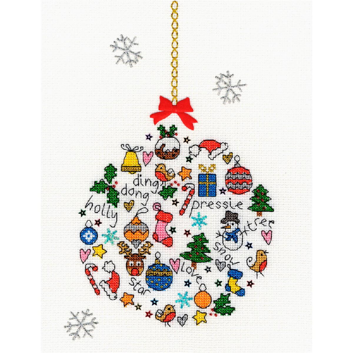 A Christmas ornament decorated with cross stitches,...
