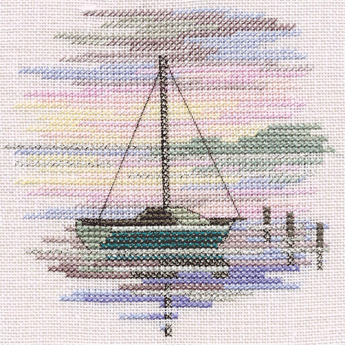 A Bothy Threads embroidery pack features a sailboat...