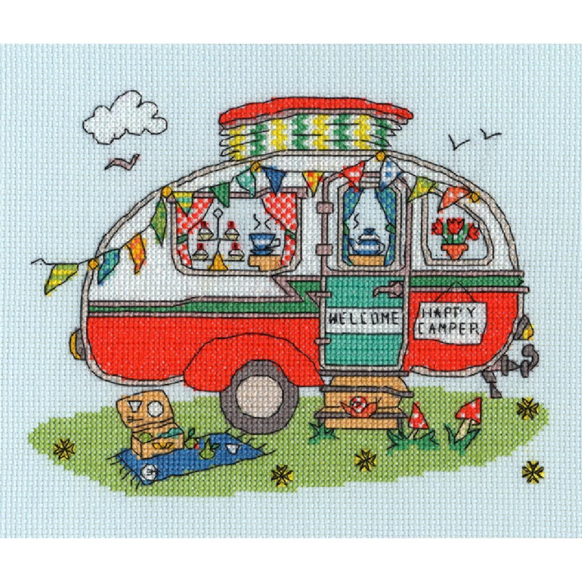 A colorful cross stitch embroidery pack of a red and...