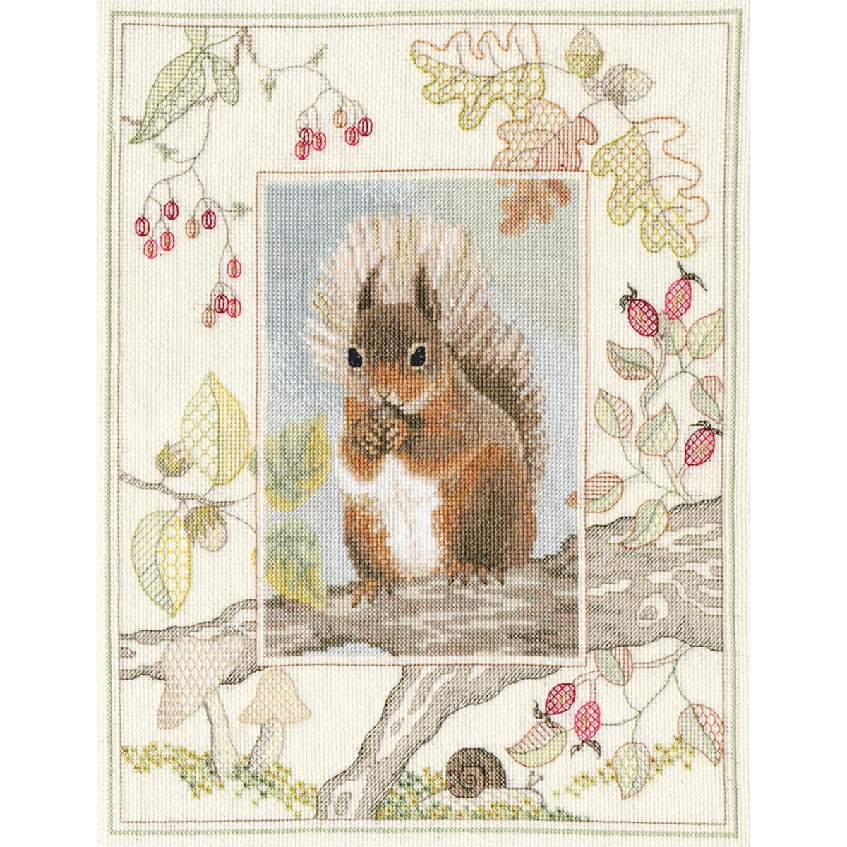 A cross stitch picture of a squirrel holding a nut and...
