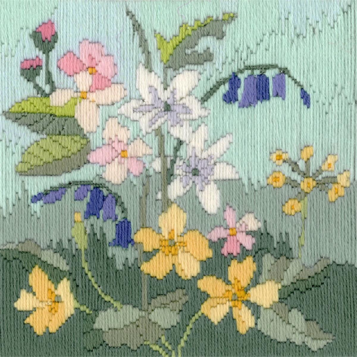 An embroidered embroidery pack with various flowers...