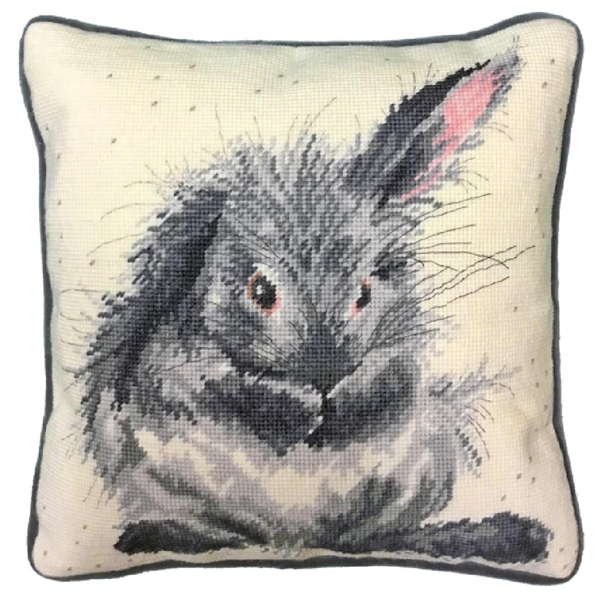 A square embroidery cushion, made as an adorable...