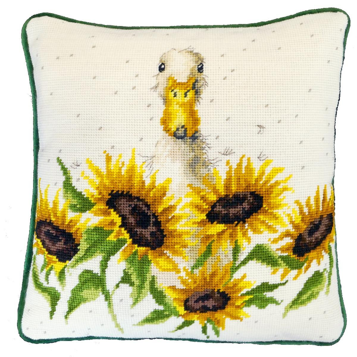 A white cushion with green piping shows a cheerful yellow...