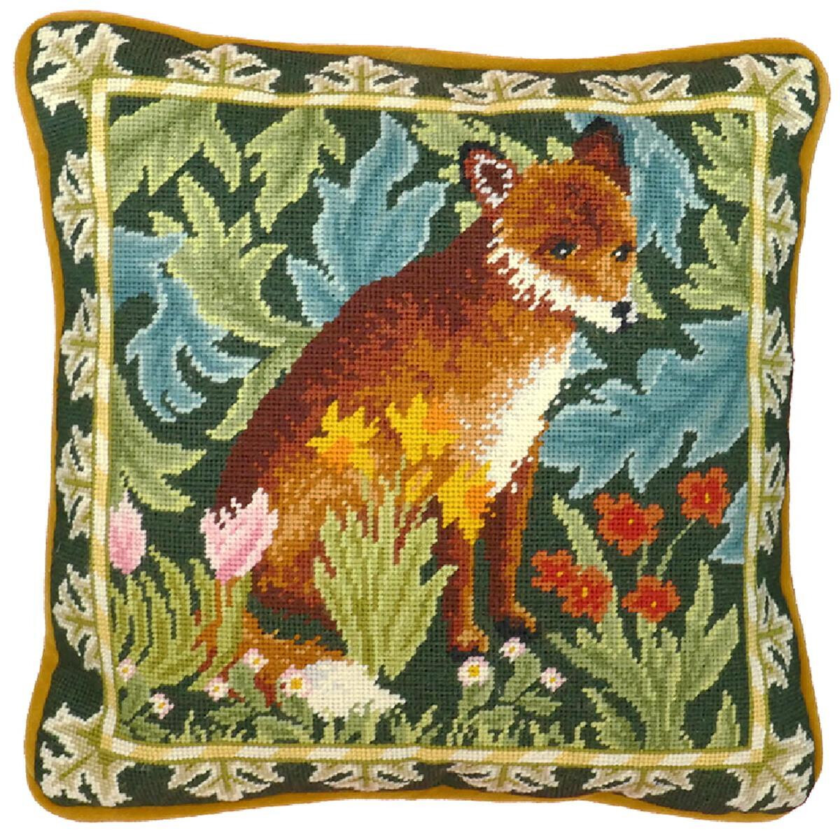 A decorative square cushion with a detailed cross stitch...