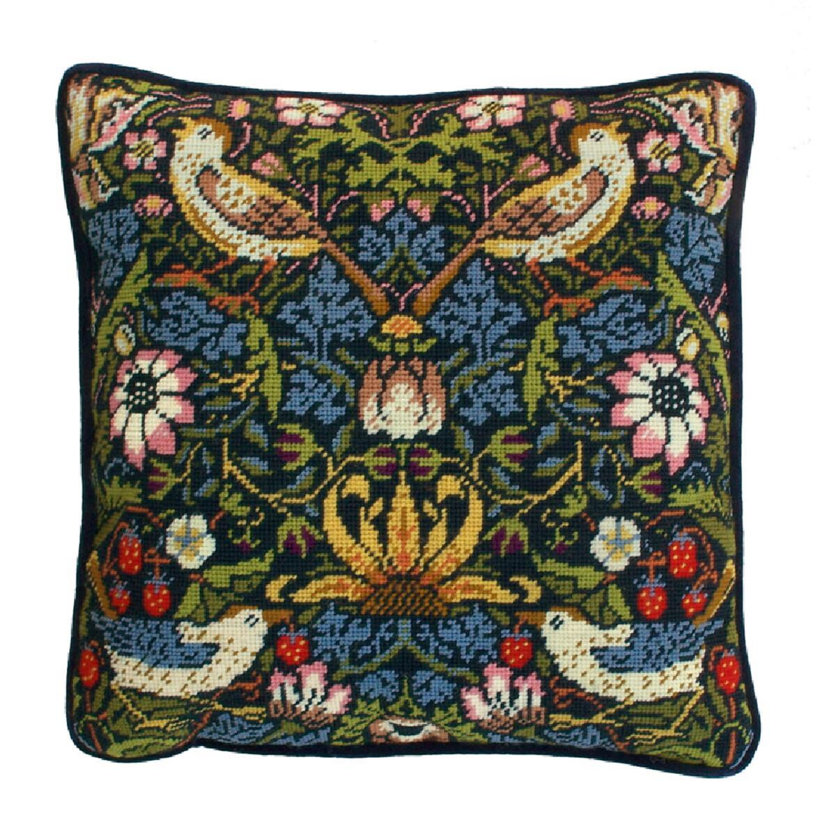 A square cushion with an intricate embroidery design...