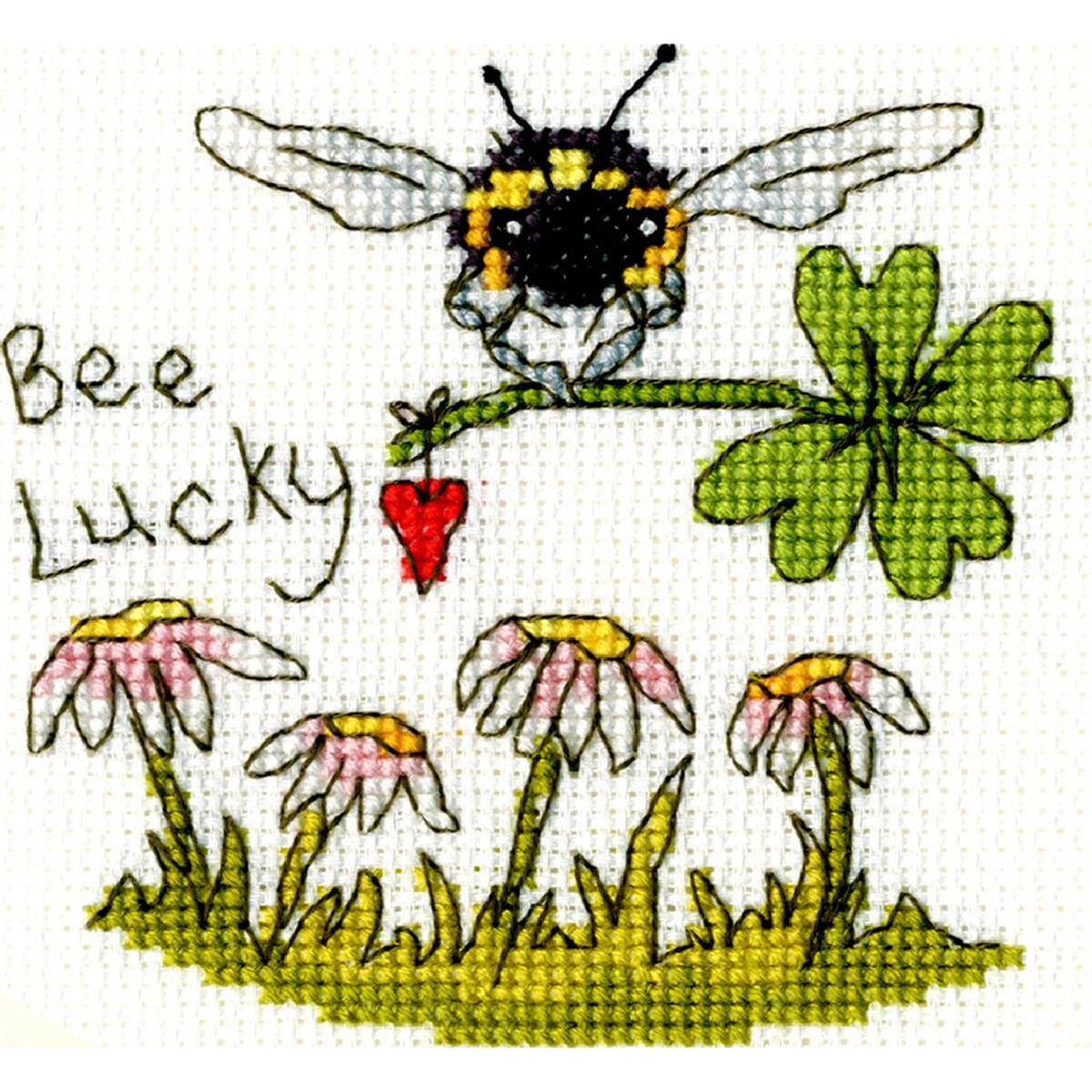 A cross stitch design (embroidery picture) with a bee...