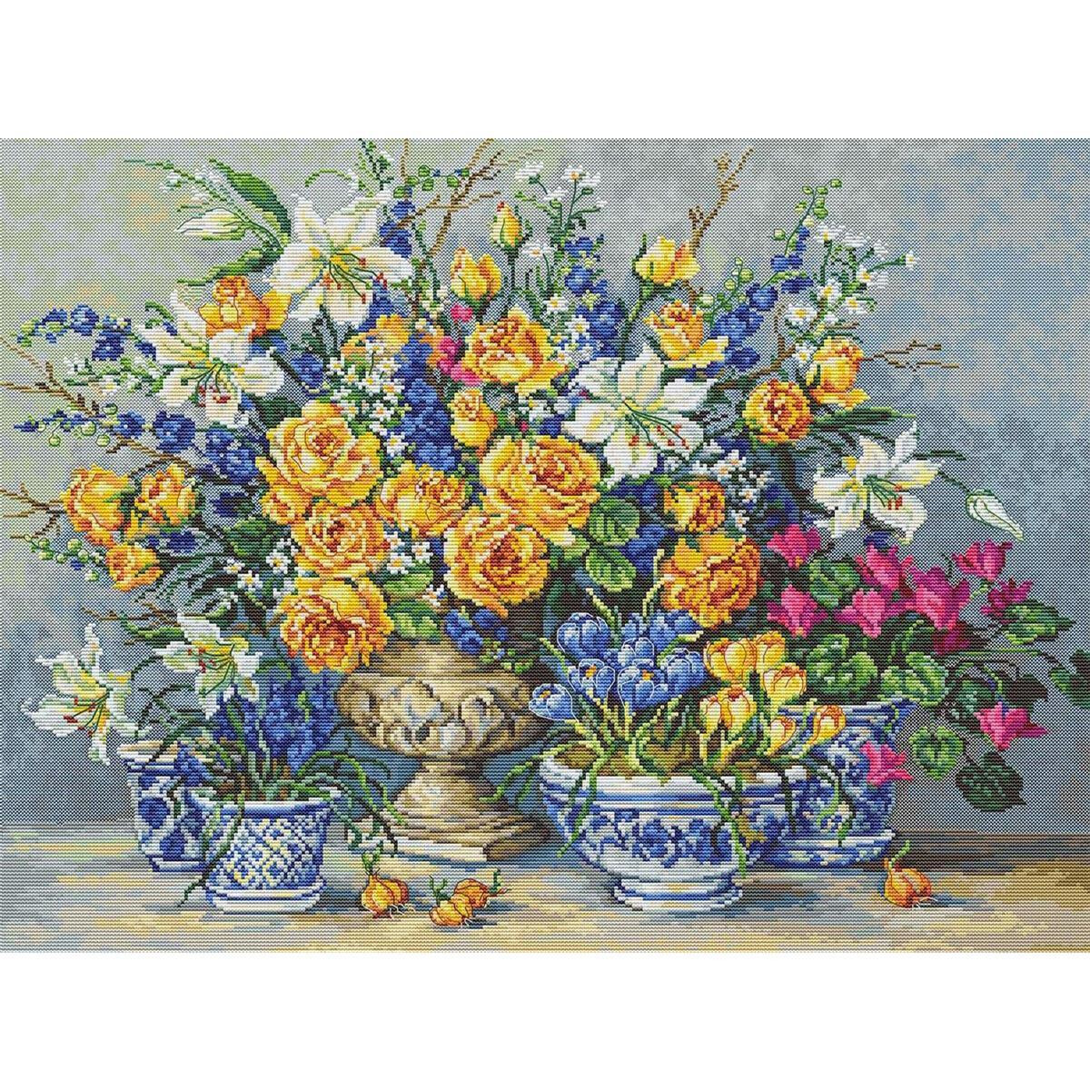 A vibrant floral arrangement consists of yellow roses,...