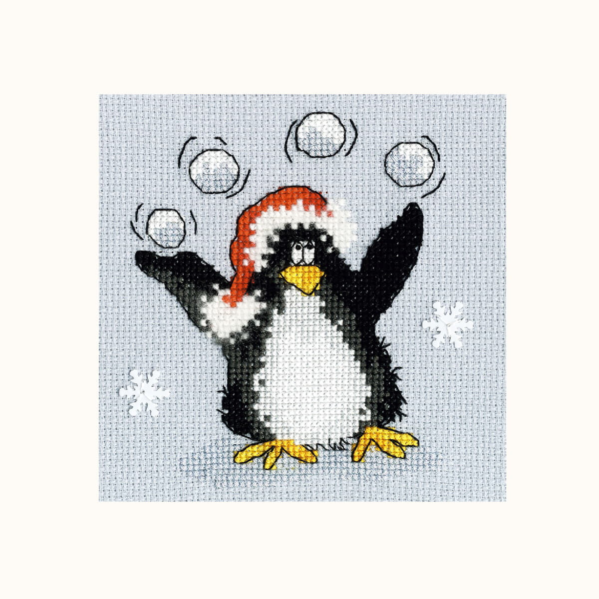 Ein Stickbild eines fröhlichen Pinguins mit...
