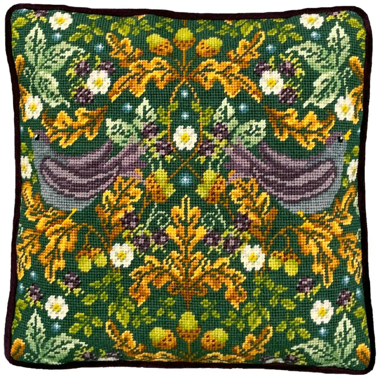 Square needlepoint cushion with a detailed floral pattern...