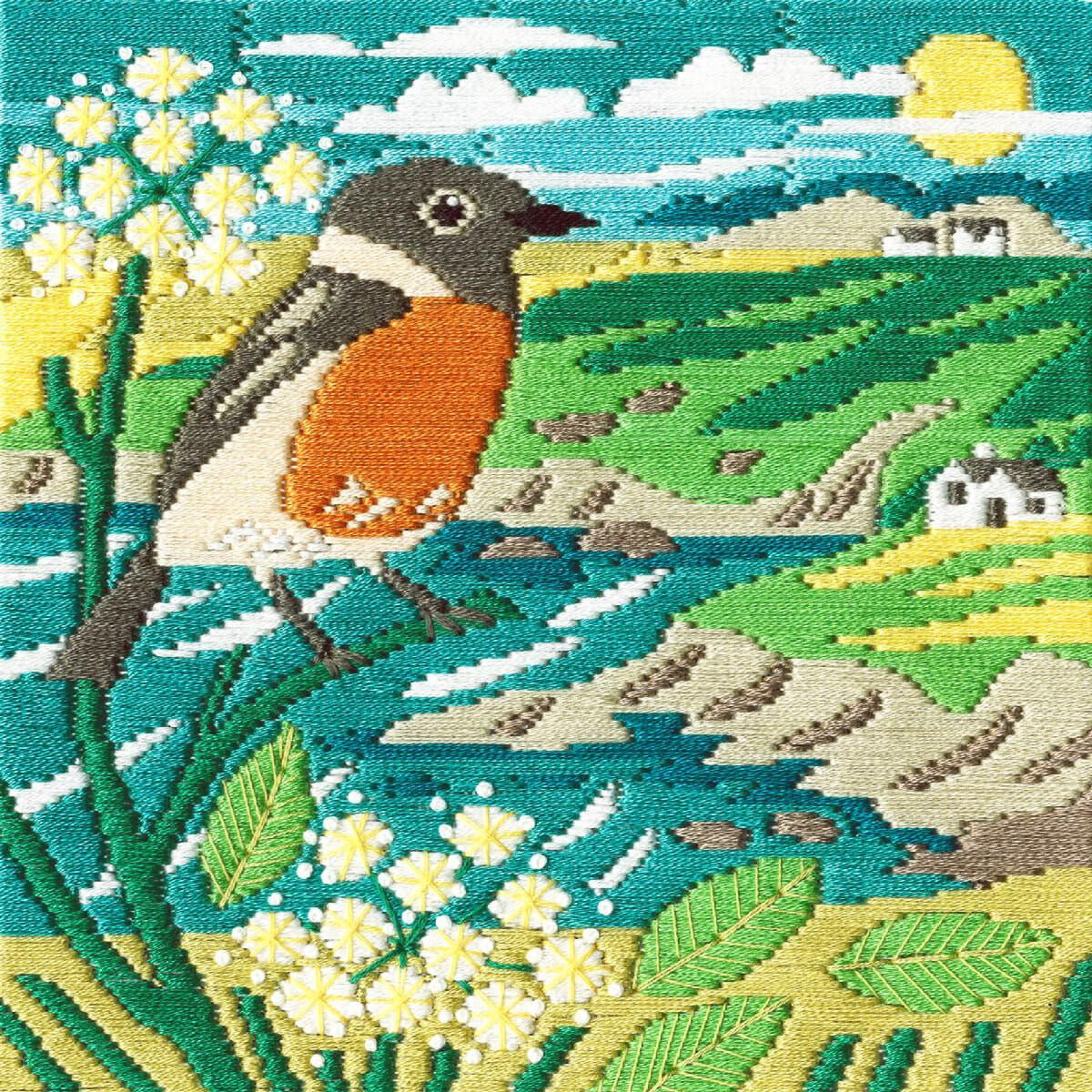 An embroidery pack from Bothy Threads showing a bird with...