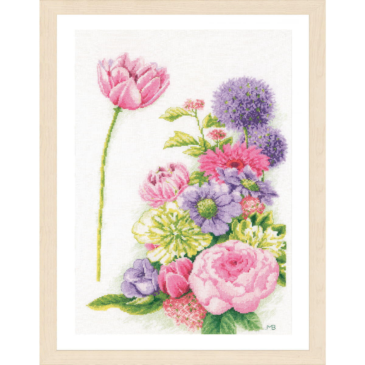 A framed floral artwork, reminiscent of a cross-stitch...