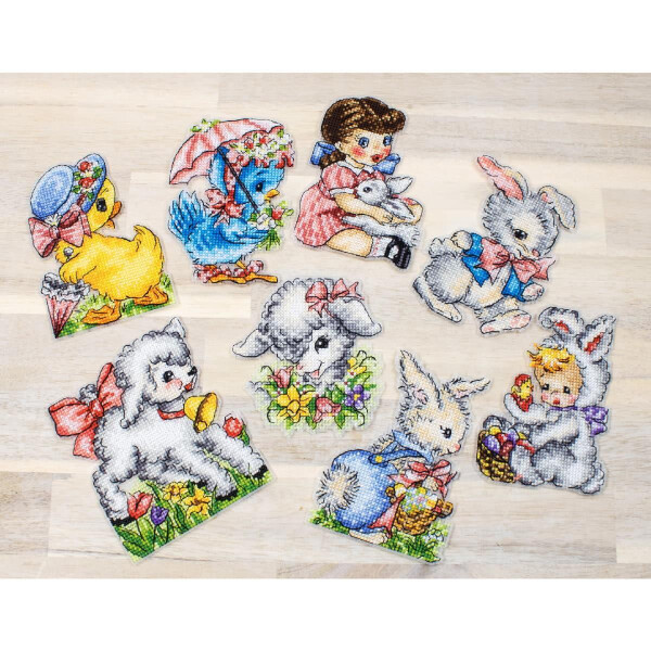 A collection of eight colorful, vintage-style embroidered animal and child figurines, including a duck, lamb, bunny, poodle and young girl. Each character holds or is surrounded by Easter related items such as flowers and baskets. The Letistitch embroidery pack is decorated with ribbons and intricate patterns.