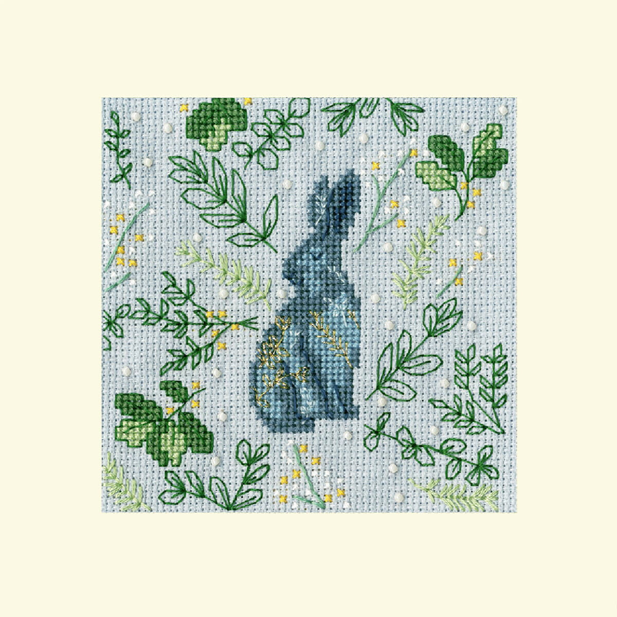 Borduurwerk van een silhouet van een konijn in...
