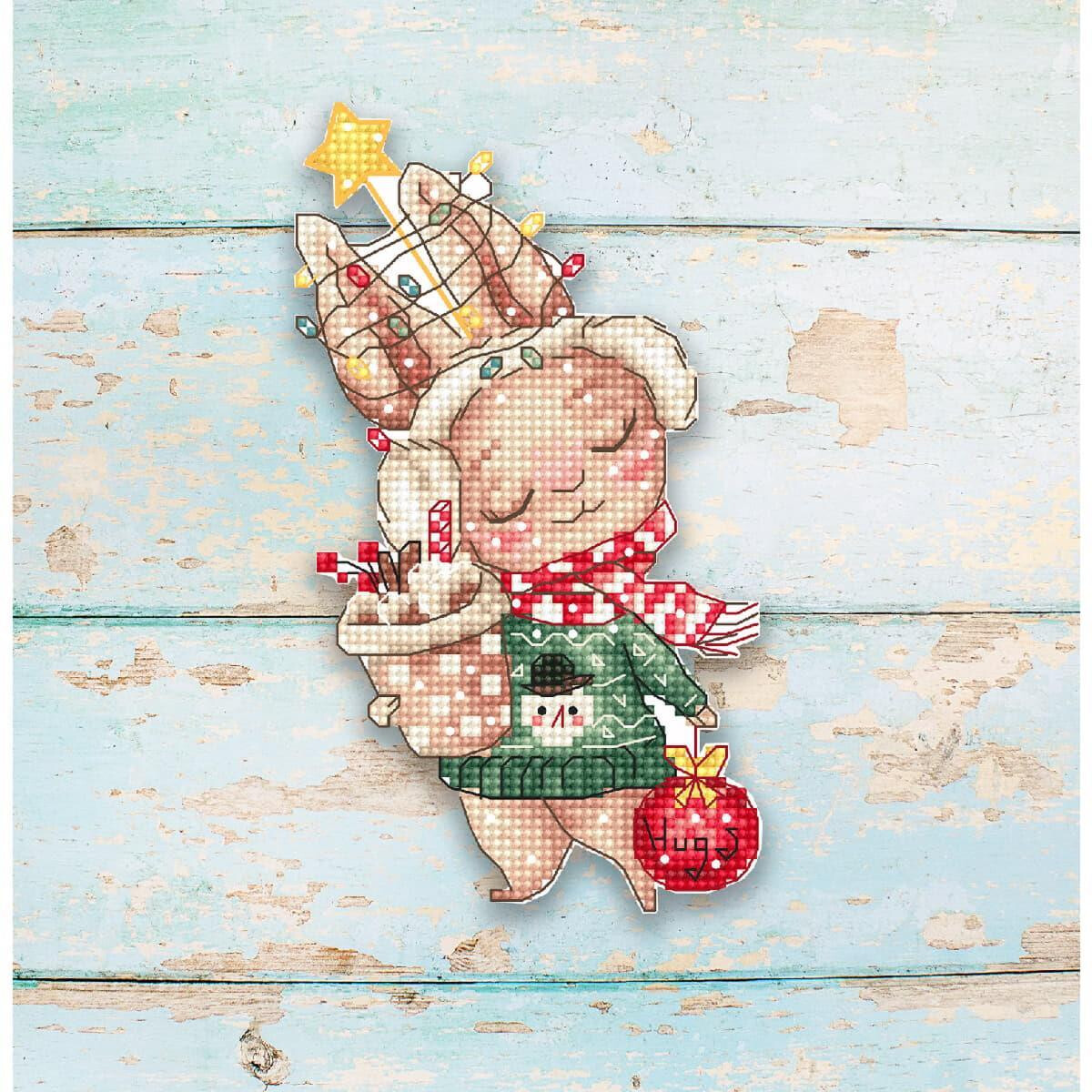 A pixel art Christmas figure with rosy cheeks and closed...