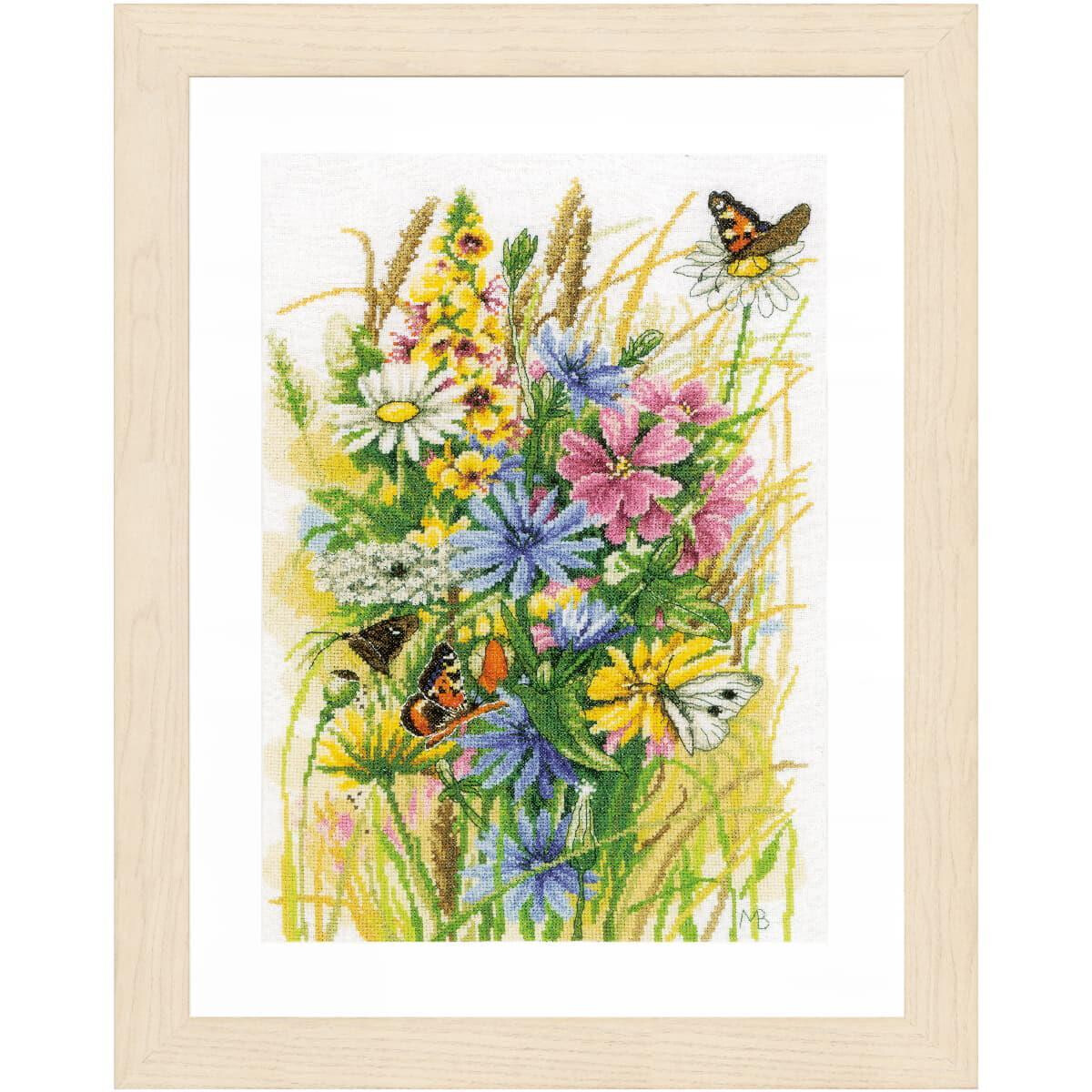 A framed painting shows a colorful bouquet of wildflowers...