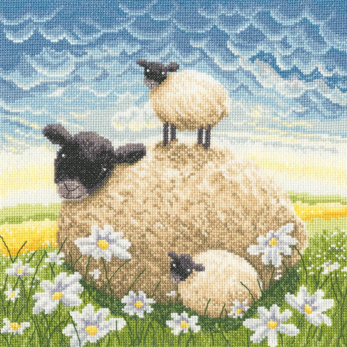 A Bothy Threads embroidery pack shows three sheep in a...