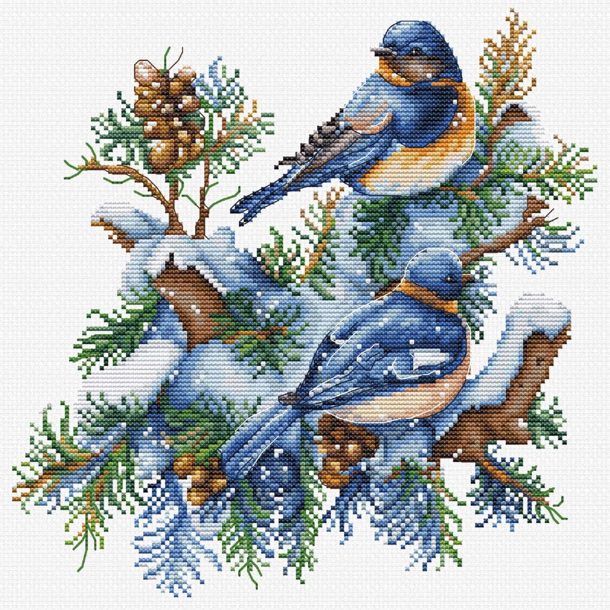 This cross stitch pattern shows two blue and orange birds...