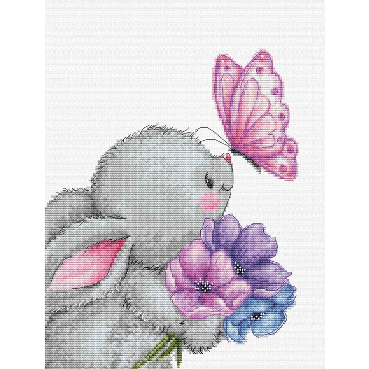A cross stitch artwork with a fluffy gray bunny holding a...