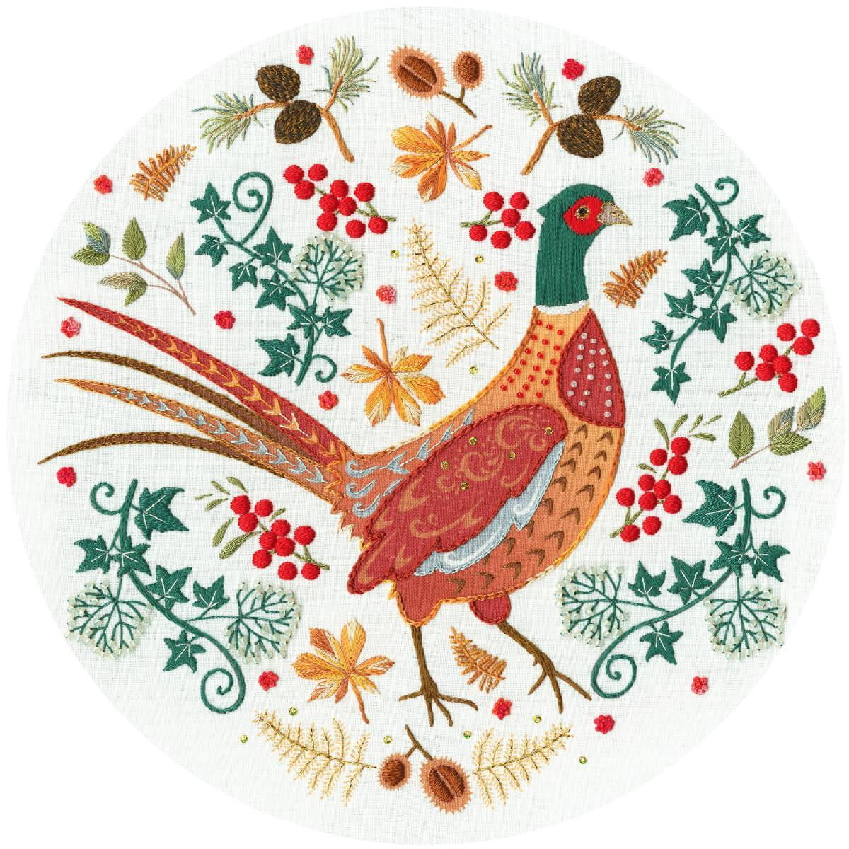 A circular embroidery design features a colorful pheasant...