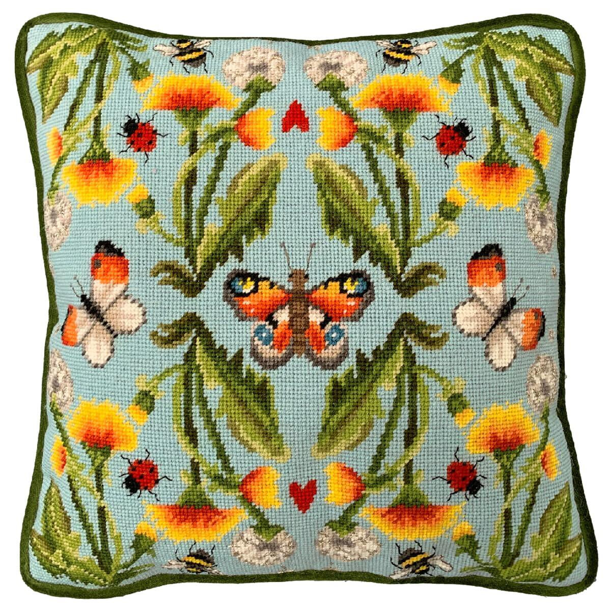 A colorful embroidered pillow in embroidery pack from...