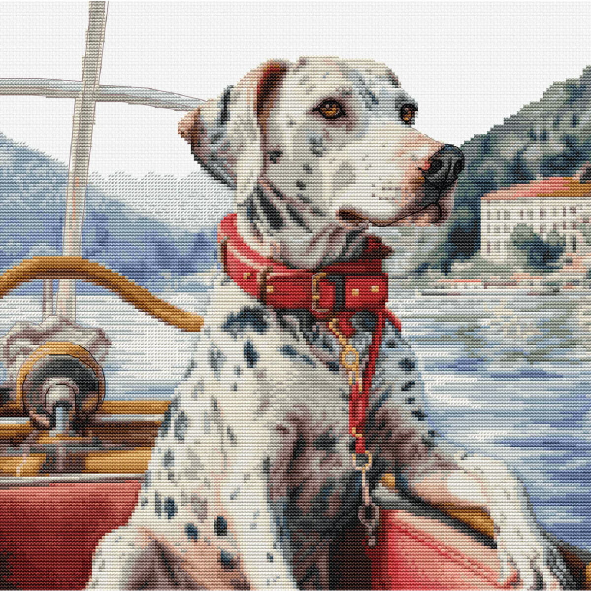 A Dalmatian with a red collar sits in a boat and looks...