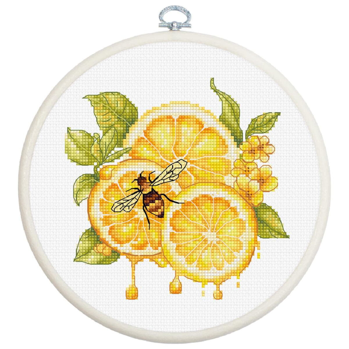 An embroidery pack from Luca-s frames a cross stitch...