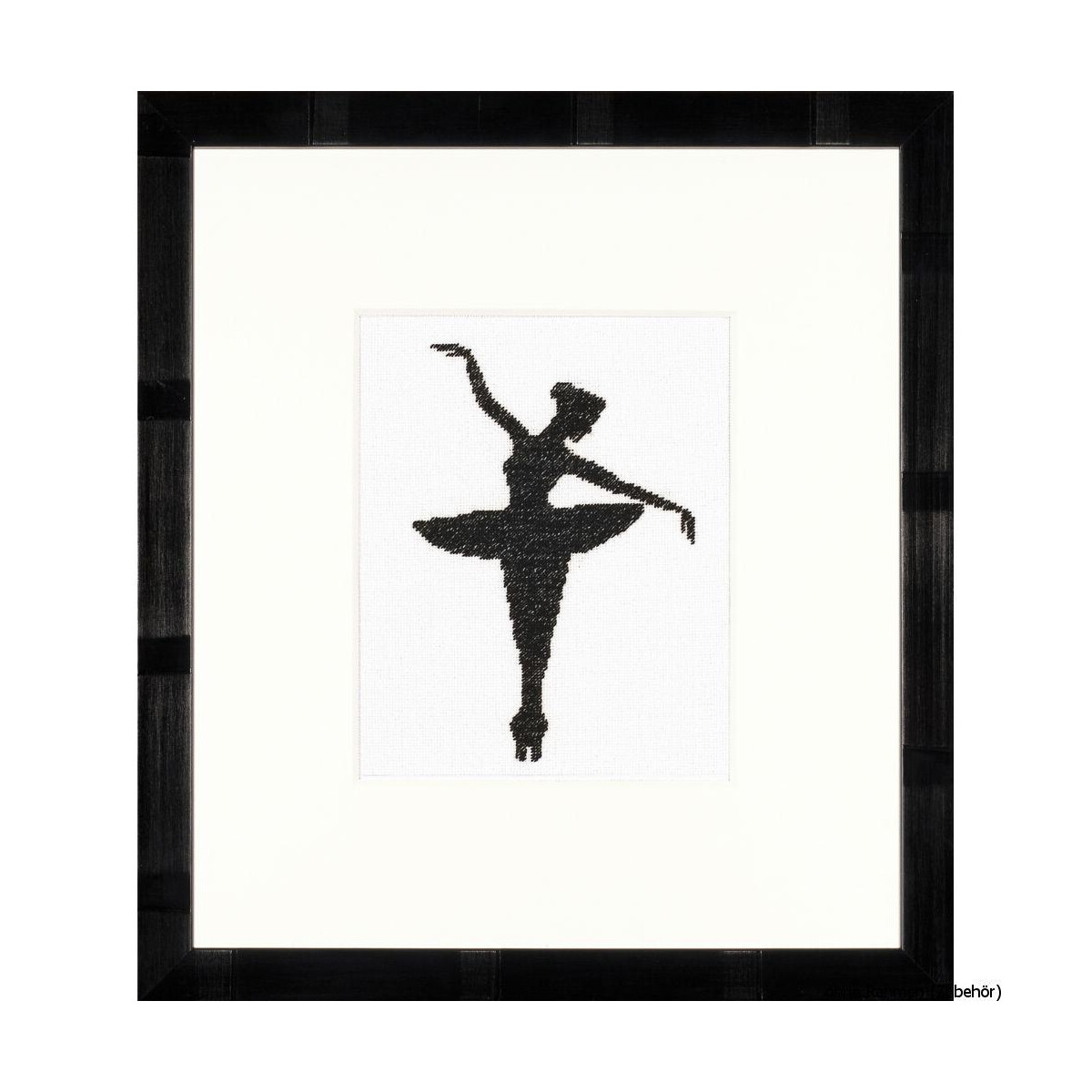 A framed work of art with the silhouette of a ballet...