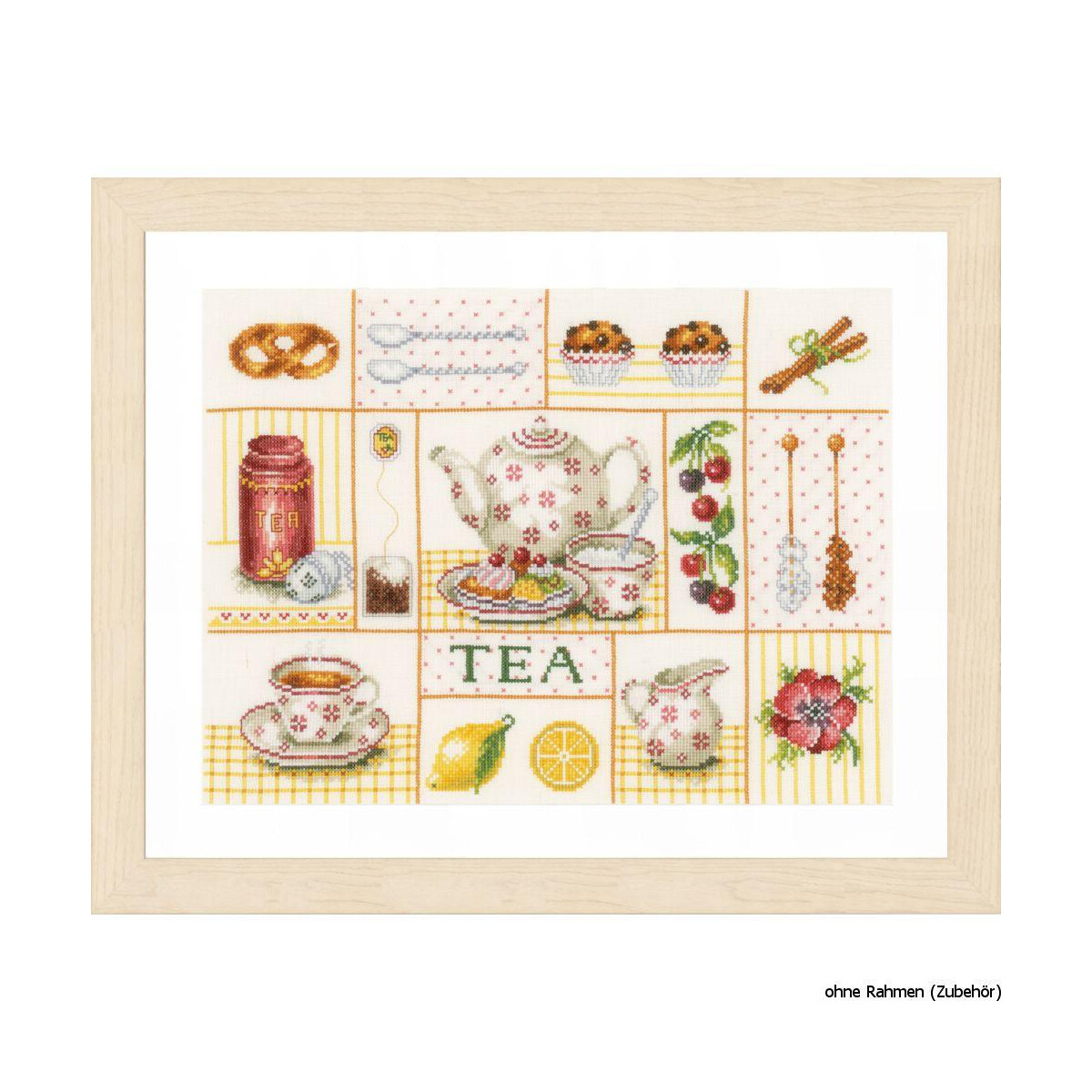 A framed cross stitch artwork features a tea theme and...